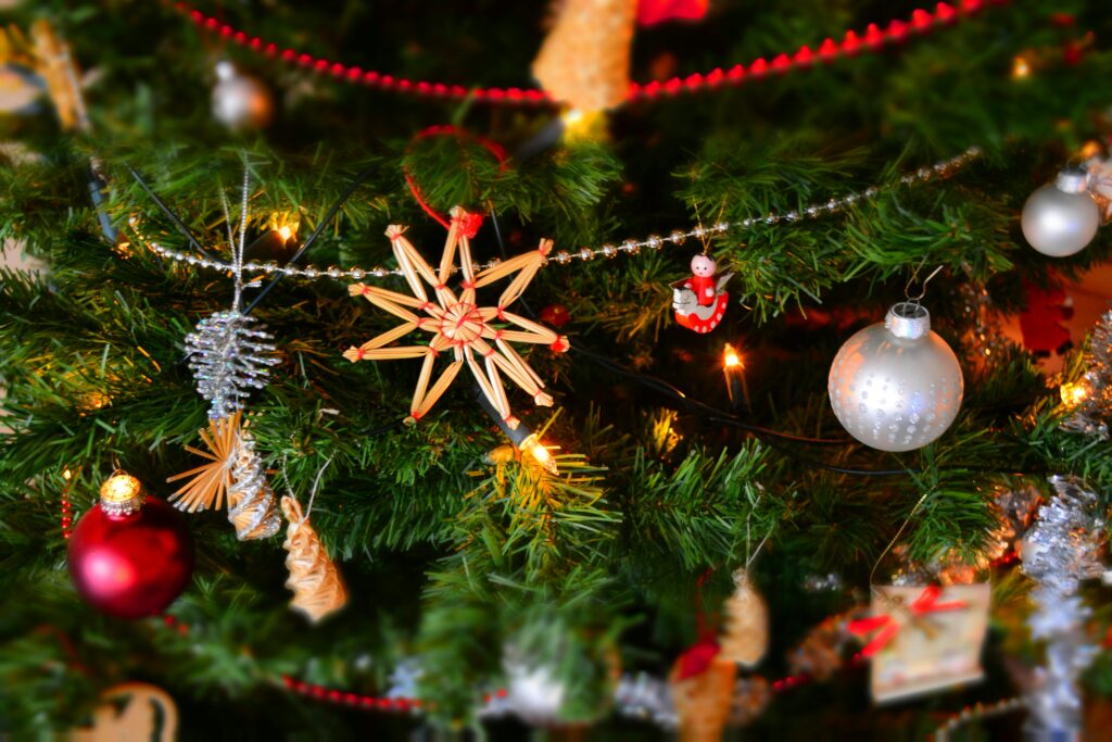 Assorted Christmas decorations on a tree